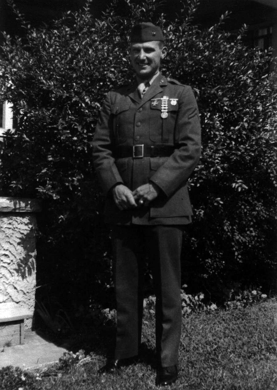 Claude Henderson, mortar section. Henderson wanted so badly to be an NCO that he had corporal's chevrons sewn onto a spare blouse - once found out, his friends teased him mercilessly. He was at last promoted to corporal, but was shot in the throat during the landing on Tinian and died aboard a hospital ship.